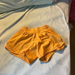 Size 0 Hotty Hot Low-Rise Lined Short 4" Mango Colored Lululemon Shorts